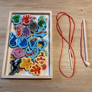 Wooden magnetic fishing and threading game